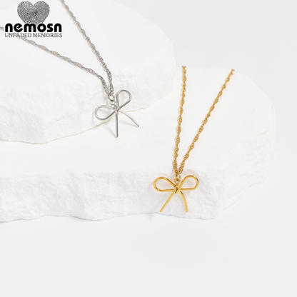 RibbonGleam™ Pendant – 18K Gold & Silver Stainless Steel Bow Charm | Minimalist, Elegant & Feminine Jewelry by Nemosn