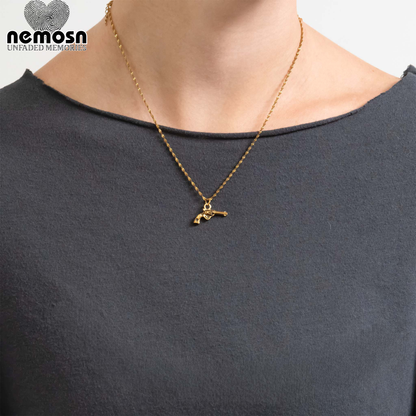 RebelCharm™ – Revolver Pendant in Gold & Silver | Bold Western-Style Charm by Nemosn