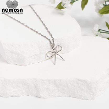 RibbonGleam™ Pendant – 18K Gold & Silver Stainless Steel Bow Charm | Minimalist, Elegant & Feminine Jewelry by Nemosn