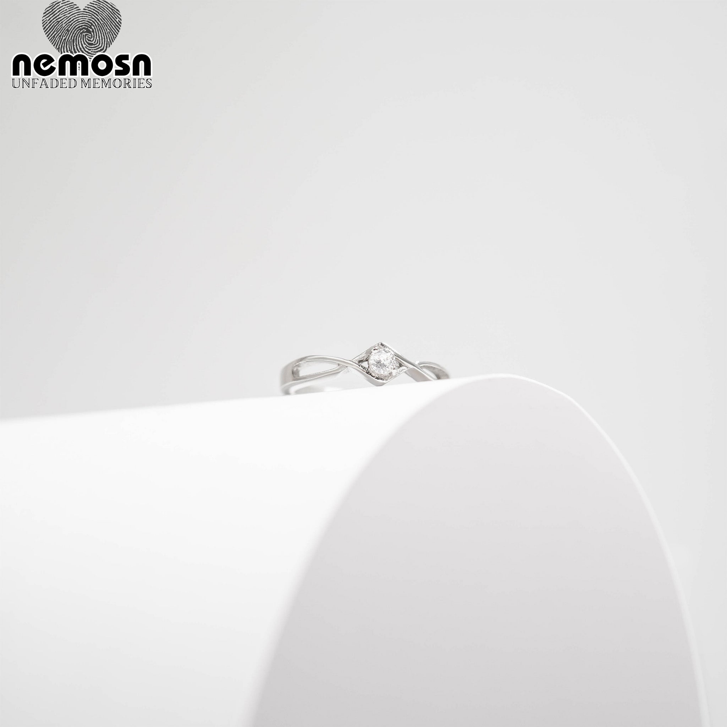 GlintLuxe™ — Elegant Twist Solitaire Ring with Polished Finish