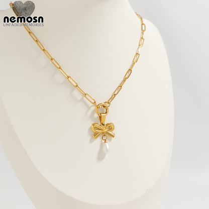 PearlBow™ Pendant – 18K Gold & Silver Stainless Steel Bow Charm with Teardrop Pearl | Elegant, Feminine & Timeless Jewelry by Nemosn