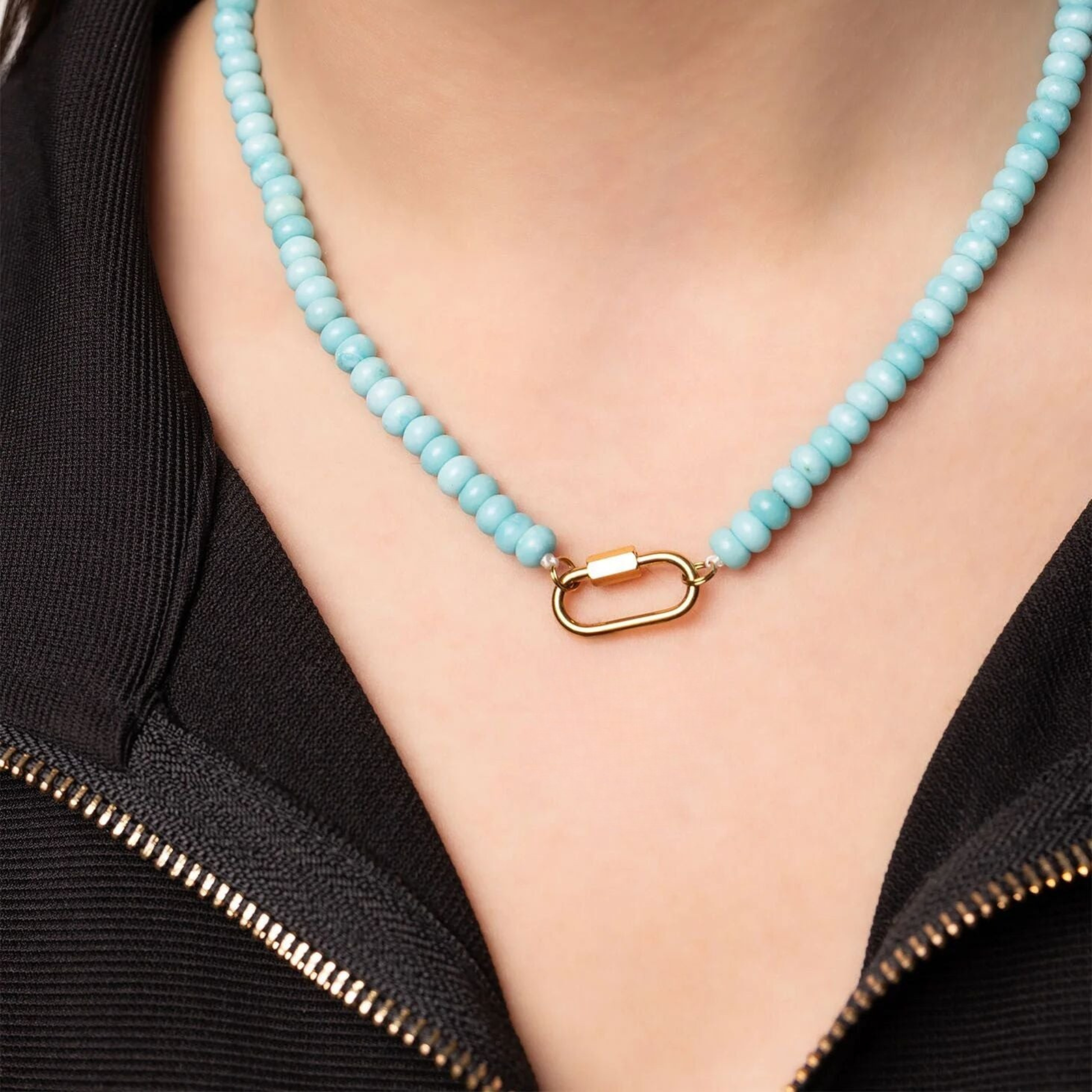Model wearing NEMOSN turquoise beaded necklace with 18K gold PVD carabiner clasp