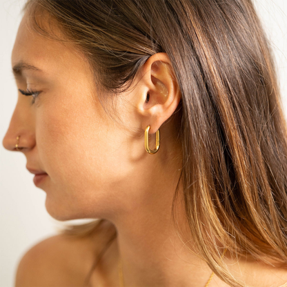 Closeup of NEMOSN FormaLink Silver Oval Hoop Earrings
