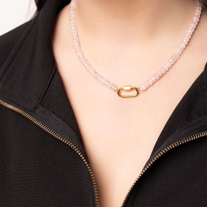 Model wearing rose quartz beaded necklace with gold stainless steel clasp by NEMOSN